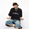 Camiseta de Manga Curta com Estampa de Leopardo e Letras Estilo Streetwear Americano para Homens e Mulheres Verão Tendência Marca Rogue Cool Solta Casual Gola Redonda Meia Manga