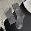 Calcetines de dibujos animados para mujer, calcetines de media pantorrilla bordados de hueso de cachorro estilo japonés, estilo universitario lindo estilo coreano, calcetines holgados de moda, sin costuras