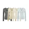 Top de punto fino, semi-transparente, ajustado, sexy, de manga larga para mujer, nuevo diseño de principios de otoño, camiseta con cuello en V, top versátil para capas