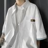 Camisa de manga corta de dos piezas falsas para hombre, camisa superior con sentido del diseño, nicho de verano de seda helada, moda ins de alto sentido, manga 3/4