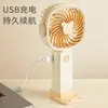 Nuevo ventilador pequeño de mano conveniente mini carga USB multifuncional para escritorio regalos de comercio exterior transfronterizo venta al por mayor