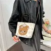 Bolso de hombro infantil estilo caricatura japonés y coreano, bolso de mano de lunares, bolsa de asas de gran capacidad, bolso de mano transfronterizo 2026