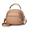 Bolso cruzado multicapa para mujer 2024 nuevo bolso para cámara bolso pequeño simple versátil transfronterizo gran capacidad portátil moderno bolso de hombro