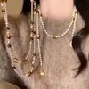 Collar de Perlas Ojo de Tigre Estilo Maillard Old Money Cadena de Clavícula Retro en Capas de Perlas Accesorios Atmósfera Otoño/Invierno