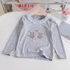Camiseta de Primavera para Niñas 2026 Nueva Elegante Moda de Primavera y Otoño Versátil Lindo Oso Top para Niñas Pequeñas