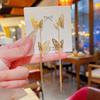 Pendientes largos elegantes de moda con aguja de plata 925, pendientes de lujo ligeros de nicho que combinan con todo, elegantes pendientes con borlas de mariposa y celebridades de Internet.