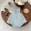 Camisa de Algodão Estilosa para Bebê Primavera 2026 Nova Tendência Cool Moda Infantil Casual Camisa Versátil para Bebê