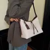 Bolsa de palha tecida retrô de design exclusivo para mulheres, nova moda 2026, bolsa versátil de ombro e transversal, bolsa tote de alta qualidade