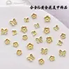 Novedad caliente joyería de flor dorada rica para uñas mariposa diy tamaño grande pequeño decoración de uñas venta al por mayor