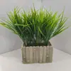 Em estoque flor artificial flor falsa buquê 7 galhos grama de primavera grama plástica decoração de casa sala de estar flores arranjo de flores com grama