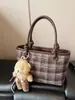 Bolso de Mano de Lujo Texturizado Tipo Cubo para Mujer 2026 Otoño e Invierno Nuevo Bolso de Hombro para el Trabajo Bolso Cruzado Retro de Nicho