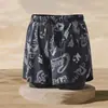 Bañadores de hombre de doble capa y corte holgado para comercio electrónico transfronterizo, anti-vergüenza, transpirables, de secado rápido, adecuados para correr, deportes y baños en aguas termales