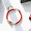 Novo estilo bracelete de aço titânio não desbota com corda vermelha anel duplo banhado a ouro rosa bolsa de dinheiro anel de mão feminino trava este ano da vida presente