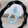 Popular llavero colgante de cuentas chapadas en colores de caramelo con lazo, llavero, accesorio para bolso, charm para funda de teléfono