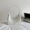 Bolso de axila de cuero encerado al aceite retro de nicho francés, bolso de media luna de alta gama moderno, versátil para el trabajo, bolso de mano 2026