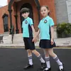 Conjunto de uniforme escolar primario, uniforme de clase de manga corta para verano, uniforme de jardín de infantes, conjunto de dos piezas de ropa infantil personalizado, playera promocional