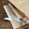En stock bolsa de papel de piel de vaca de doble capa engrosada bolsa de almacenamiento para empaque de ropa bolsa exprés a prueba de humedad sin plástico log