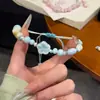 Série Trançada de Pulseiras de Cerâmica com Corda Feitas à Mão com Flores Fofas e Frescas de Cinco Pétalas, Joias Ajustáveis Simples e Versáteis