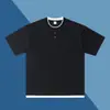 Estilo Novo Verão 2026 260g Gola Redonda Abotoada Toque Fresco Falso Duas Peças Manga Curta Camiseta Casual Versátil Solta Manga Meia-Manga Camiseta
