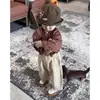 Conjunto de Roupa de Primavera Infantil 2026 Novo Estiloso Conjunto de Duas Peças para Meninos Camisa de Manga Longa Xadrez Retrô e Macacão para Bebê