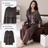 Nuevo conjunto de pijama de algodón puro para mujer con sujetador incorporado, caracterizado por mangas largas y pantalones largos, un diseño de dibujos animados y un estilo cómodo e informal que también se puede usar como ropa de estar en casa.