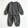 Conjunto de moletom liso infantil para comércio exterior, conjunto de duas peças outonal, calça de moletom com punho, corte solto, unissex, fornecimento de vestuário infantil