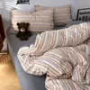 2026 Novo Estilo Simples Estilo Retrô Algodão Lavado Conjunto de Quatro Peças Capa de Edredom Lençol de Cama Conjunto de Três Peças para Dormitório de Estudante