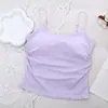 Elegante camisola sin espalda con diseño plisado, adecuada para usar como capa exterior o interior, con copas de sujetador incorporadas, un corte que estiliza y perfecta para el verano