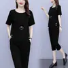 Traje de Verano Talla Grande Moda Casual Elegante Moderno Adelgazante de Gama Alta Camiseta de Manga Corta Pantalones Capri Conjunto de Dos Piezas Ropa para Mujer