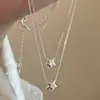 Artículo de Moda de Tendencia de Xiaohongshu: Collar con Forma de Estrella de Cinco Puntas Incrustada con Circonia en Forma de Diamante, Estilo Minimalista, Lujo Ligero para Ir al Trabajo, Estilo de Nicho