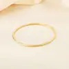 Estilo Personalidad Moda Transfronteriza Europea y Americana Anillo Liso de Alambre Redondo de 3 mm en Oro de 18 Quilates Diseño Integrado Pulsera Apilable para Mujer de Acero Inoxidable
