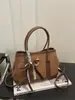 Bolso Retro Pequeño para Viajes Diarios para Mujer 2025 Nuevo Otoño e Invierno Moda Bolso Cruzado Bolso de Mano de Nicho Simple Bolso Tote Pequeño