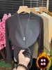 Camiseta Base de Cuello Medio Alto para Otoño e Invierno para Mujer 2026 Nuevo Mousse Cepillado Más Terciopelo Ajuste Delgado Cálido Nicho Ropa Interior Superior