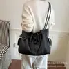 Bolso de mano retro casual de gran capacidad para mujer, nuevo bolso de hombro de moda de alta gama para ir al trabajo, otoño 2026