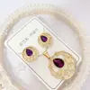 Nuevo especial transfronterizo explosión de tendencia europea y americana titanio acero alta calidad color collar pendientes traje femenino joyería de concha real