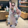 Funda de Teléfono Creativa de Dibujos Animados Linda Correa Corta para Muñeca Encanto Anti-Pérdida Cadena para Cámara CCD Cadena para Teléfono Venta al por Mayor