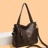 Bolso tote retro de moda nuevo para otoño 2026 transfronterizo, gran capacidad, adecuado para el uso diario, se puede llevar en la mano, usar como bolso de hombro o colgar cruzado