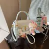Bolso de mano de color liso de moda para mujer, nuevo y elegante bolso cuadrado pequeño estilo biker 2026, bolso de hombro moderno y texturizado