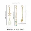 C0736 Serie Oceánica Transfronteriza Set de Colgantes de Vieira y Caracola Hebilla de Bikini Llavero de Cuentas de Semilla para Playa