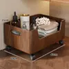 Caja de almacenamiento con ruedas universales para mover debajo del mueble de TV o la cama de la sala de estar, utilizada para organizar y almacenar ropa del hogar, bocadillos y artículos diversos