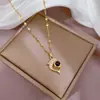 [Aço Titânio] Luxo Leve Micro-incrustado Ouro Real Pedra de Projeção Golfinho Colar Feminino Nova Corrente em Arco Luxo Leve Design de Nicho Sensação