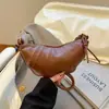 Bolsa de Couro de Chifre de Boi de Alta Qualidade para Mulheres 2026 Novo Estilo Design de Nicho Porta-moedas Bolsa de Ombro Transversal Luxo Leve