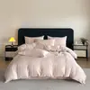 Juego de cuatro piezas de algodón cepillado ultrasuave y amigable con la piel, estilo de lujo ligero de alta gama, funda nórdica suave y simple de jacquard de algodón lavado, funda de almohada