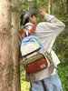 Mochila Casual de Gran Capacidad con Bloques de Color Transfronteriza 2025 Nueva Mochila de Viaje Ligera Mochila Escolar para Estudiantes de Comercio Exterior