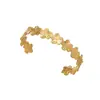 Europa y Estados Unidos Nuevo Color Oro de 18k Acero Inoxidable Pulsera Pulsera para Mujer Alto Sentido Flor Hoja Apertura Pulsera de Titanio