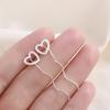 Directo de fábrica simple hueco dulce mano esmerilado amor aretes de plata esterlina temperamento borla larga línea de oreja para mujer