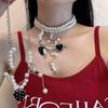 Collar con borlas de circonitas negras y diseño de perla larga con cadena de clavícula exagerada