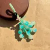 Llavero de Uvas Atractor de Fortuna con Nuevas Perlas de Uva Verde y Roja Estilo Chino de Verano