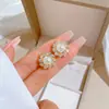 [Combinação de terno] Colar de pérolas rotativas de luxo elegante com zircônio completo em rede vermelha, fabricante de corrente de clavícula da moda feminina