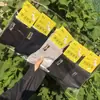 26 modelos de otoño e invierno al por mayor: Calcetines deportivos de algodón de media pantorrilla para otoño e invierno, calcetines versátiles para hombres y mujeres